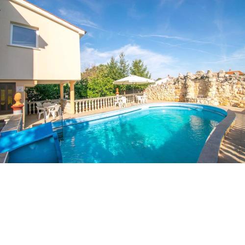 Apartment Ivo with shared swimming pool