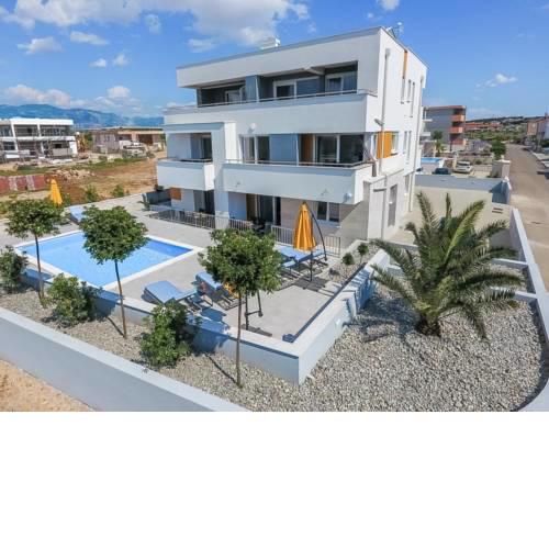 Apartments and rooms with a swimming pool Novalja, Pag - 17217
