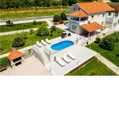Awesome apartment in Gruda with Outdoor swimming pool, WiFi and 3 Bedrooms