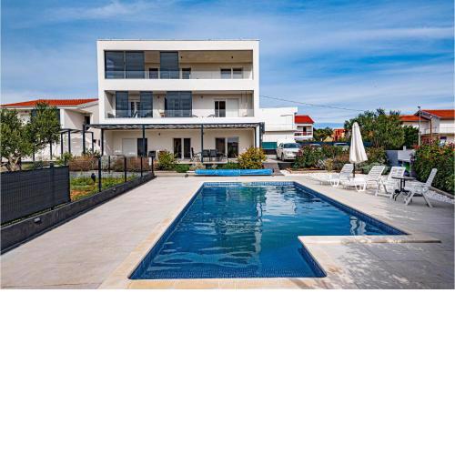 Awesome apartment in Tribunj with Outdoor swimming pool and 2 Bedrooms