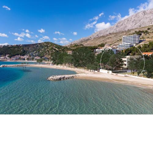 Beachfront Villa Erce with private 40sqm heated pool, a Gym, 7 en-suite bedrooms, a rooftop terrace, 2 living areas