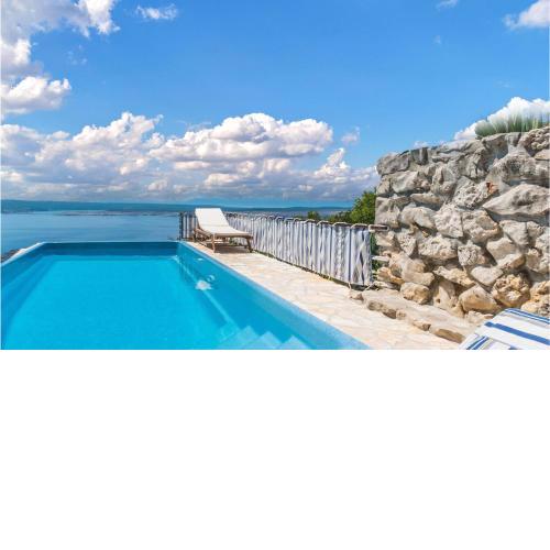 Beautiful home in Dramalj with Outdoor swimming pool and 7 Bedrooms
