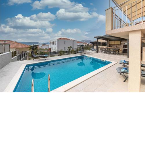 Beautiful home in Okrug Gornji with Outdoor swimming pool, WiFi and Heated swimming pool
