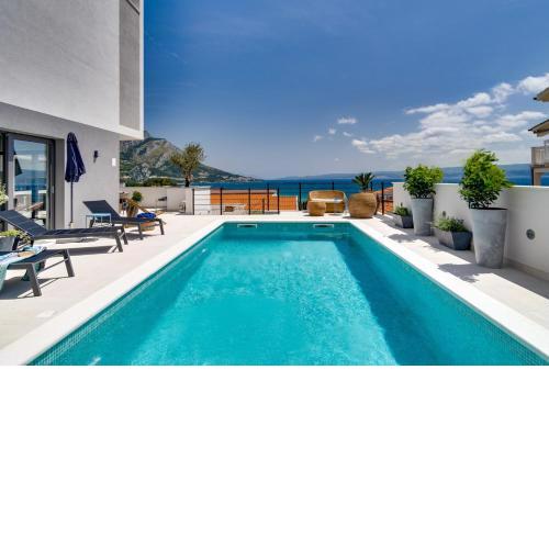 Brand new! Seaview villa Mila with 4 en-suite bedrooms, private pool, Finnish sauna, Treadmill, sandy beach 250m