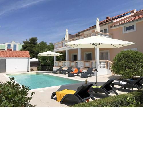 Family friendly apartments with a swimming pool Biograd na Moru, Biograd - 19356