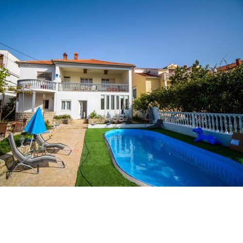 Family friendly apartments with a swimming pool Zadar - 17553