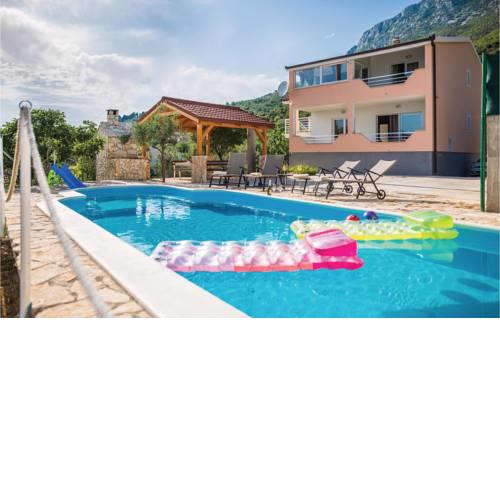 Five-Bedroom Holiday home Kastel Sucurac with Sea View 09