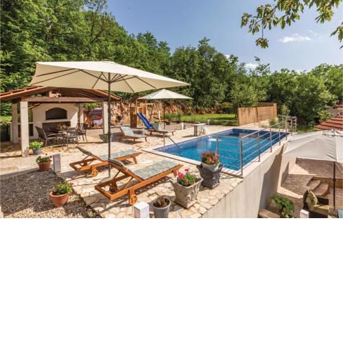 Four-Bedroom Holiday Home in Grubine