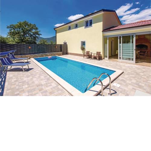 Four-Bedroom Holiday Home in Jurdani