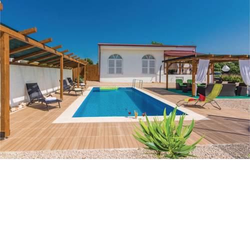 Four-Bedroom Holiday Home in Kakma