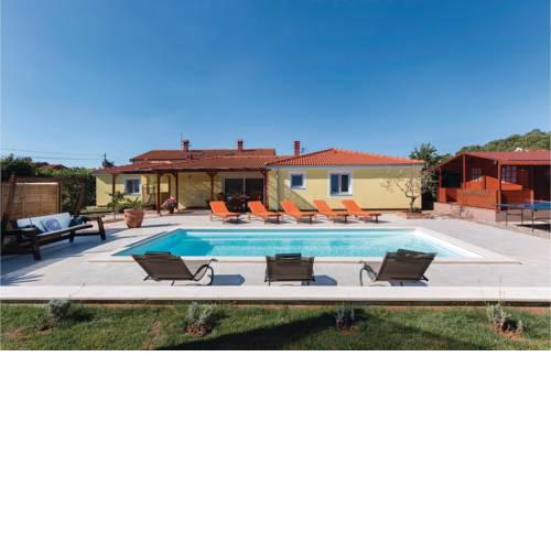 Four-Bedroom Holiday Home in Loborika