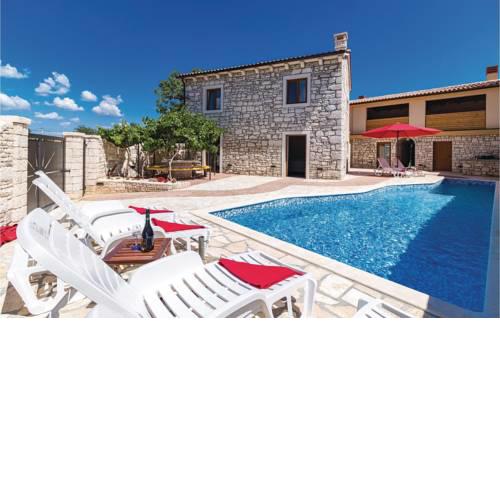 Four-Bedroom Holiday Home in Marcana