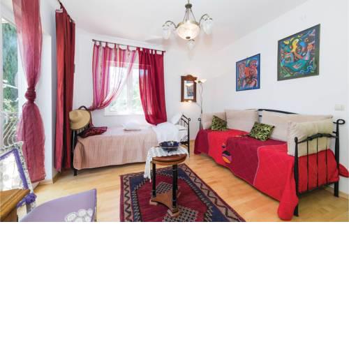 Four-Bedroom Holiday Home in Okrug Gornji
