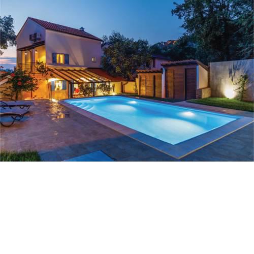 Four-Bedroom Holiday Home in Omisalj