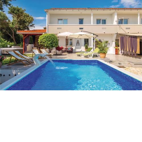 Four-Bedroom Holiday Home in Povljana