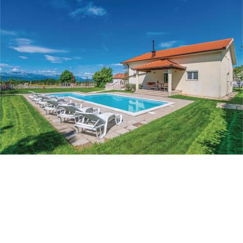 Four-Bedroom Holiday Home in Vinjani Donji