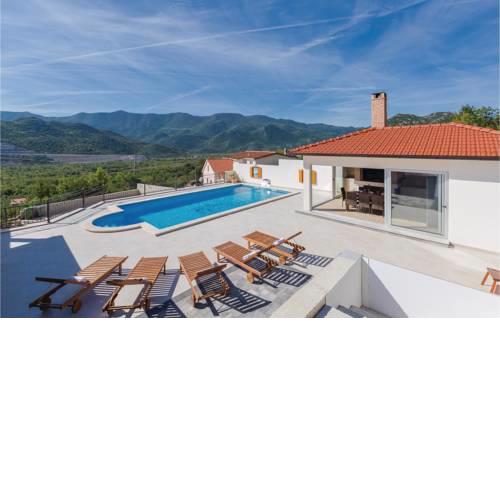 Four-Bedroom Holiday Home in Vrgorac