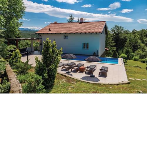 Four-Bedroom Holiday home Jurdani with a Fireplace 08