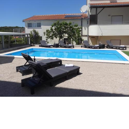 Modern island apartment with pool 80 meters from the sea A