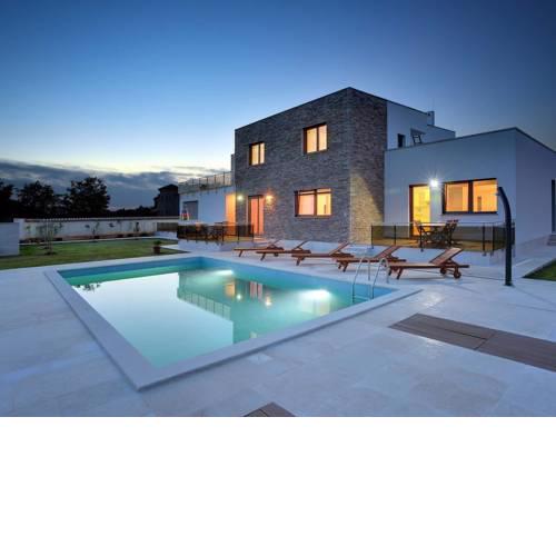 Modern villa consisting of two apartments with private pool, beach at 1 km