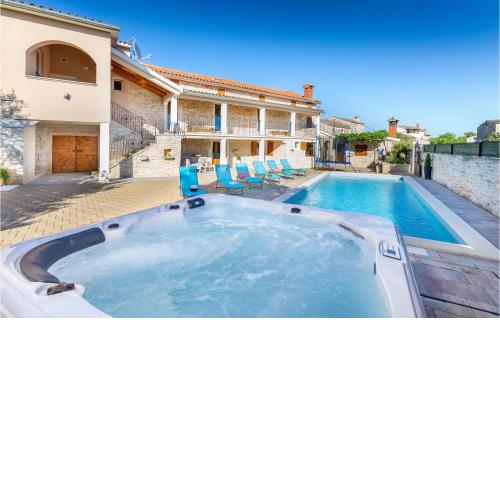 Nice home in Vodnjan with Outdoor swimming pool, Jacuzzi and 4 Bedrooms