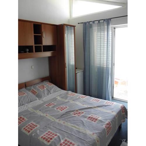Room in Podgora with sea view, balcony, air conditioning, Wi-Fi (214-8)