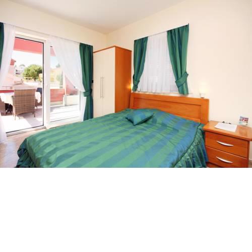 Seaside apartments with a swimming pool Barbat, Rab - 4980