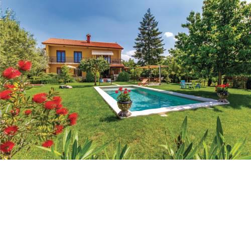 Six-Bedroom Holiday Home in Marcana