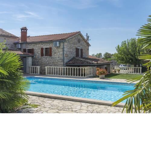 Stone holiday house with a spacious yard and private pool