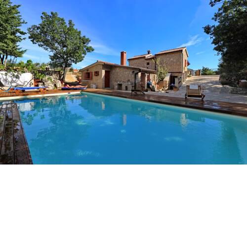 Stone house with pool near sea