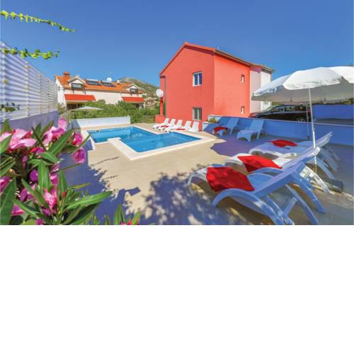 Stunning home in Seget Vranjica w/ Outdoor swimming pool and 4 Bedrooms