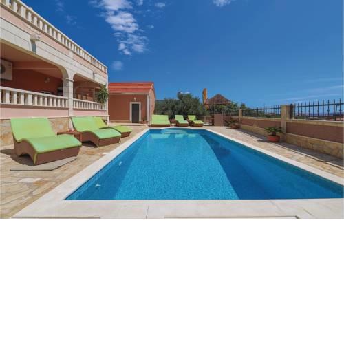Six-Bedroom Holiday Home in Kastel Sucurac with Sea View