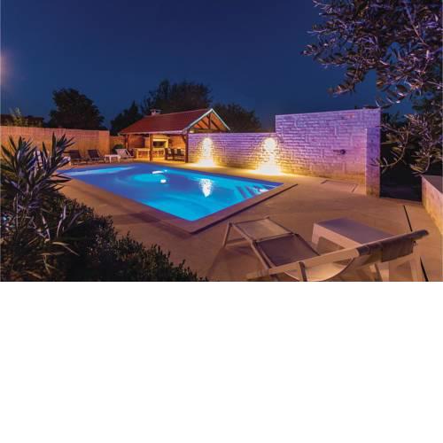 Three-Bedroom Holiday Home in Marcana