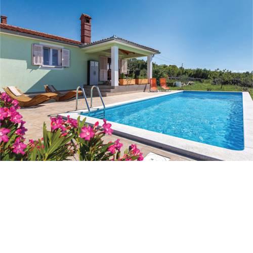 Two-Bedroom Holiday Home in Koromacno