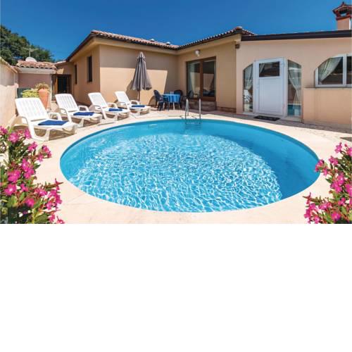 Two-Bedroom Holiday Home in Marcana