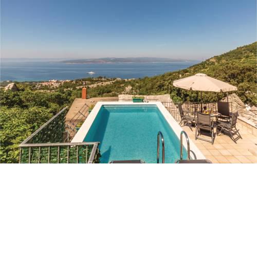 Two-Bedroom Holiday Home in Topici