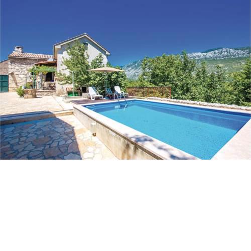 Two-Bedroom Holiday home in Tribalj