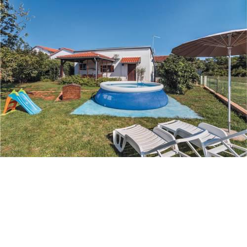 Two-Bedroom Holiday Home in Valbandon